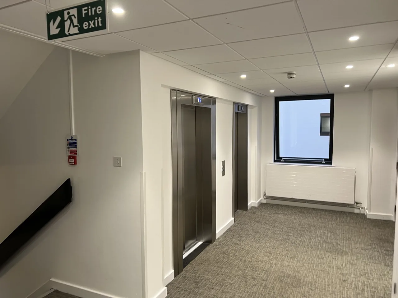 Completed lift lobby with plastered and decorated entrances by Oracle Builders
