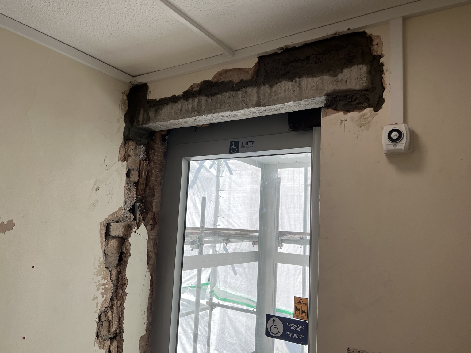Lift opening exposed for structural alteration